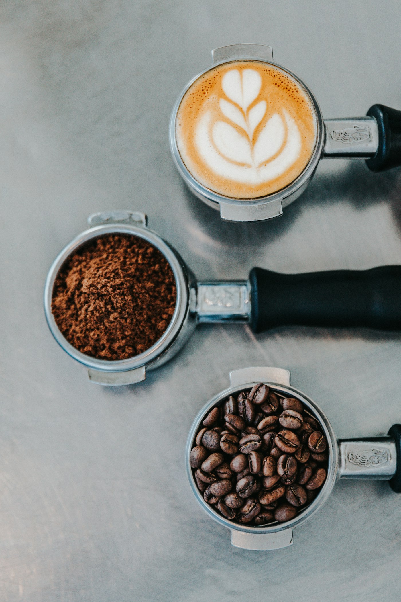 Fresh espresso extraction and roasted coffee beans at BABY AFRO Coffee Bar