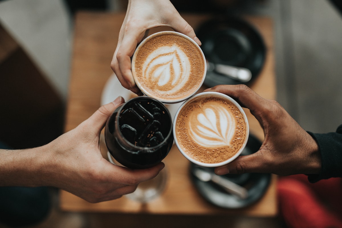 Specialty coffee cups served with latte art