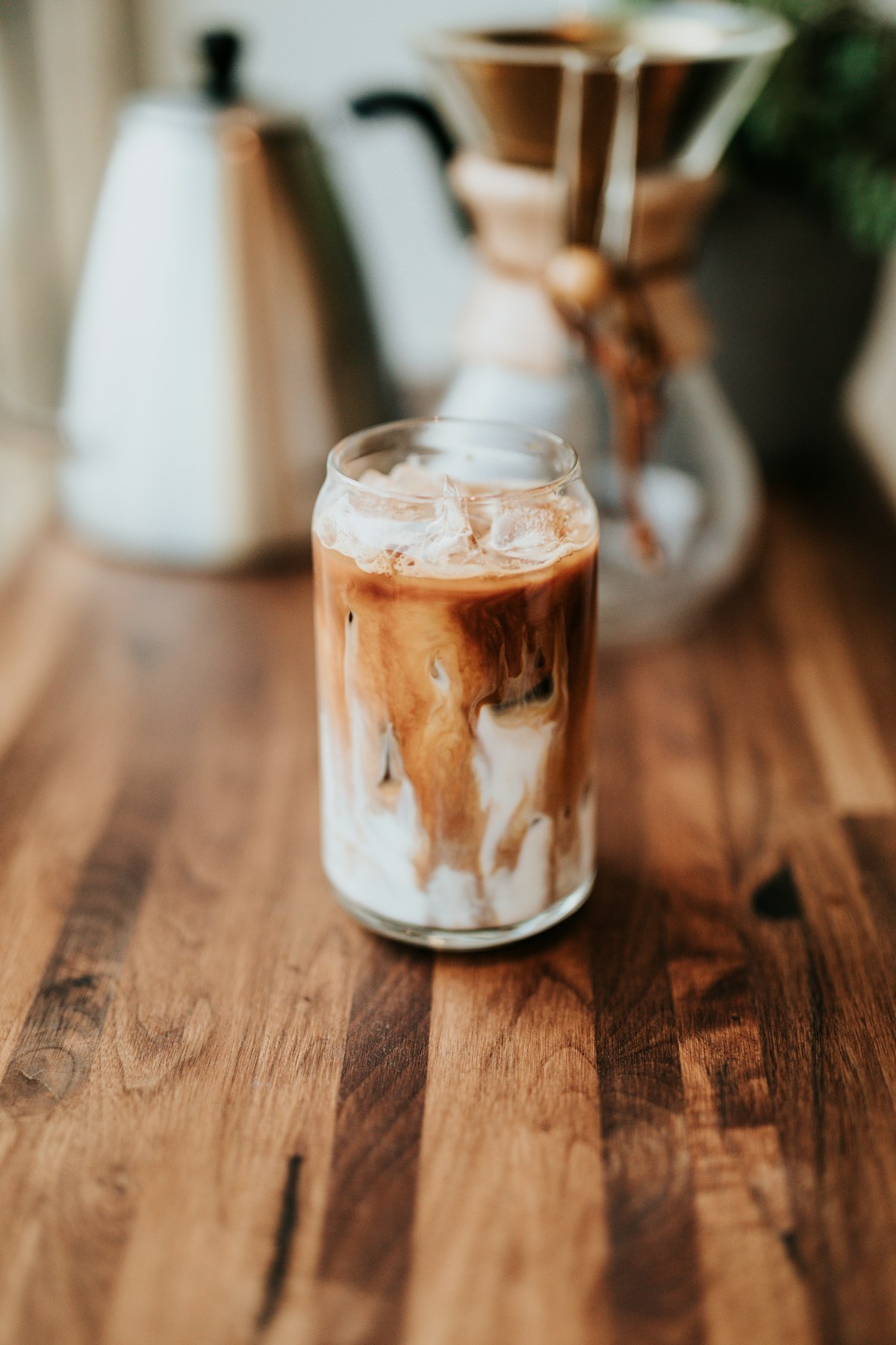Refreshing iced coffee glass with ice and espresso